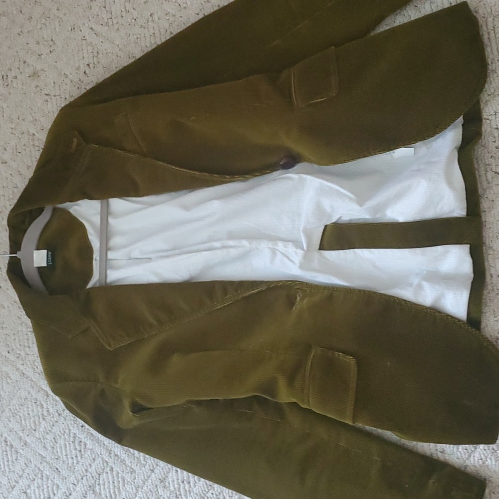nice corduroy green button jacket with white inside and pockets.
